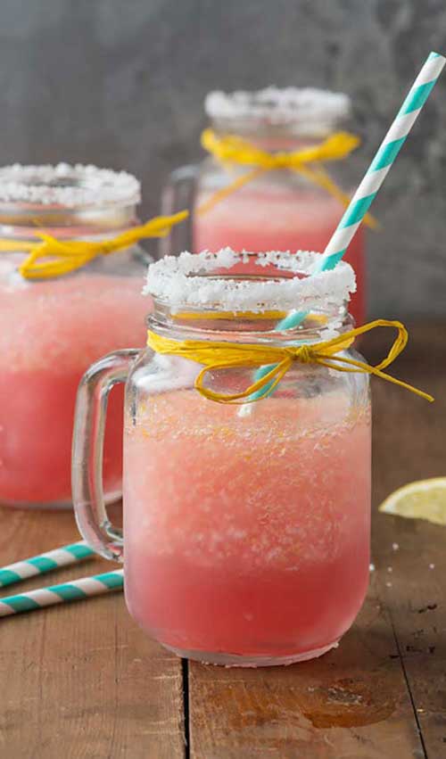 This pretty pink lemonade margarita recipe will get any party started! It’s the perfect tangy drink to sip on at any outdoor party.
