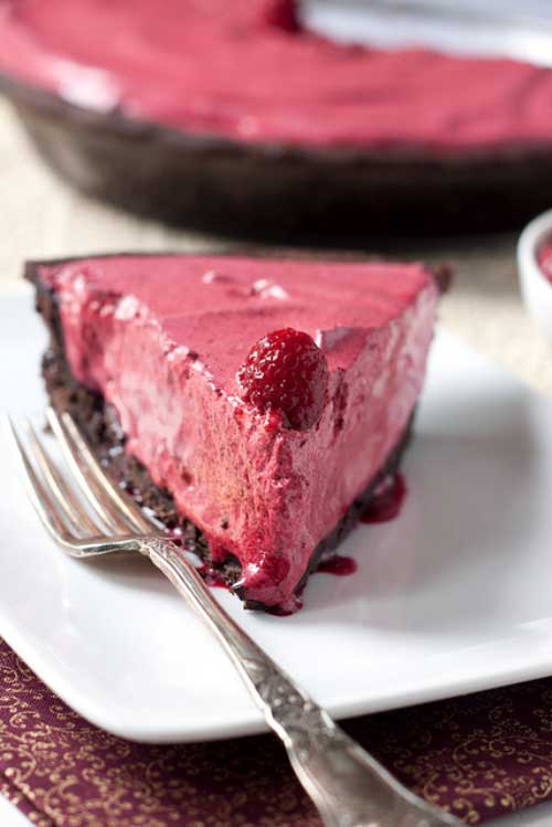 Recipe for Frozen Raspberry Pie - The raspberry meringue is a little sweet and a little tart. I bet it would be great with strawberries or cherries or different kinds of cookies in the crust, too.