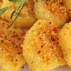 The aroma of roasted potatoes, garlic and rosemary may just cause these Garlic and Rosemary Crusted Potatoes to disappear before they ever get a chance to hit the table!
