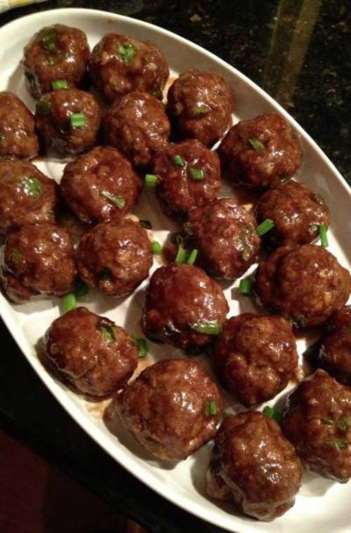 Recipe for Asian Style Meatballs - These tasty meatballs have a great punch of Asian flavors. Set a plate out of these easy-to-make meatballs and they'll disappear before you know it!
