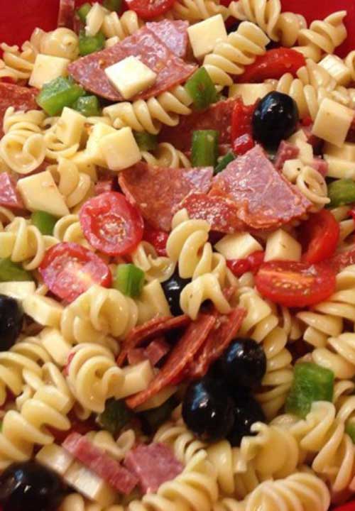 Recipe for Awesome Pasta Salad - This is the best pasta salad I’ve ever eaten, and people request it frequently. It’s a very easy, light side dish for a picnic or dinner.