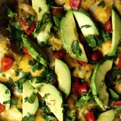 Recipe for Chorizo Breakfast Enchilada Casserole - A delicious savory breakfast casserole with a Latin twist. Made with spinach, sweet potatoes, onions, black beans, eggs, and chorizo this casserole can be made the night before and baked in the oven the next day.
