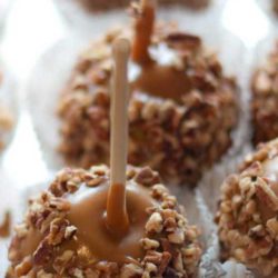 Recipe for Homemade Caramel Apples - I make these often in the fall, and also for many parties, for me this has been the best recipe and I have tryed my share --- kids of all ages just love these!