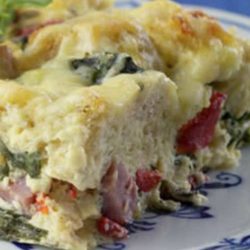Recipe for Ham and Cheese Breakfast Casserole - This healthy update of a traditionally rich ham-and-cheese breakfast strata has plenty of flavor, with half the calories and one-third the fat of the original.