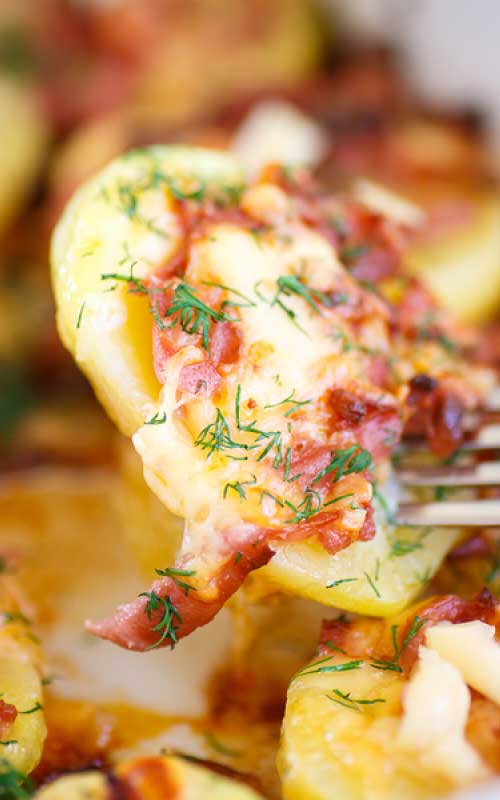 Recipe for Baked Potatoes With Bacon And Cheese - How do you make baked potatoes even better? Cook them with bacon AND cheese! Bacon and cheese make EVERYTHING better!