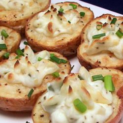 Recipe for Twice-Baked Potato Bites - Served with additional chives on top for flare, these would be a fun make-ahead appetizer or a tantalizing side for a variety of main dishes.