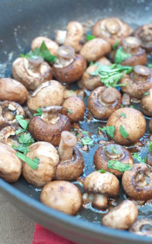 Recipe for Butter Garlic Mushrooms - A super simple yet incredibly flavorful side dish of mushrooms satueed in butter and garlic.