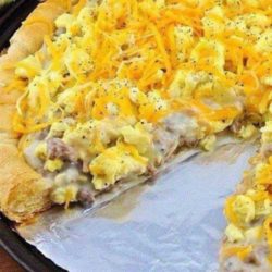 This Sausage Gravy Breakfast Pizza is almost like biscuits and gravy…with extra sausage AND cheese! Yes please!