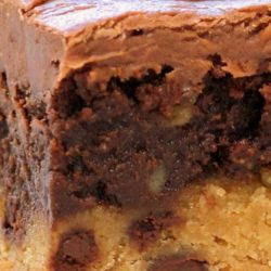 Recipe for Frosted Cookie Brownies - Oh my gosh!! Really? Chocolate chip cookie, brownie, and chocolate frosting!! This recipe had my mouth watering just looking at the picture!