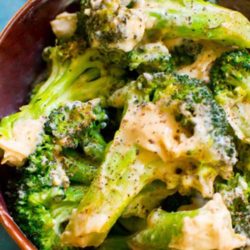 Recipe for Creamy Garlic Broccoli - Creamy garlic coats steamed, roasted garlic an accent of black pepper over top. Find out what my secret one-step ingredient is to make this healthy-delicious side dish!