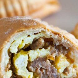 Recipe for Sausage Egg and Cheese Mini Hand Pies - This was a quick and easy recipe. It was a great brunch meal for the kids! The big kids (adults) were fighting over the last ones!