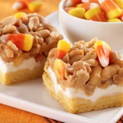 Recipe for Scarecrow Treats - These Halloween desserts, topped with candy corn, are chewy and delicious.