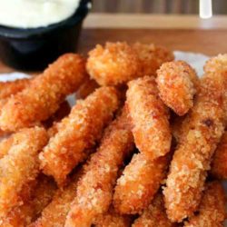 Recipe for Buffalo Chicken Fries - Crispy chicken fries with a hint of zesty buffalo sauce, perfect for dipping into fresh bleu cheese.