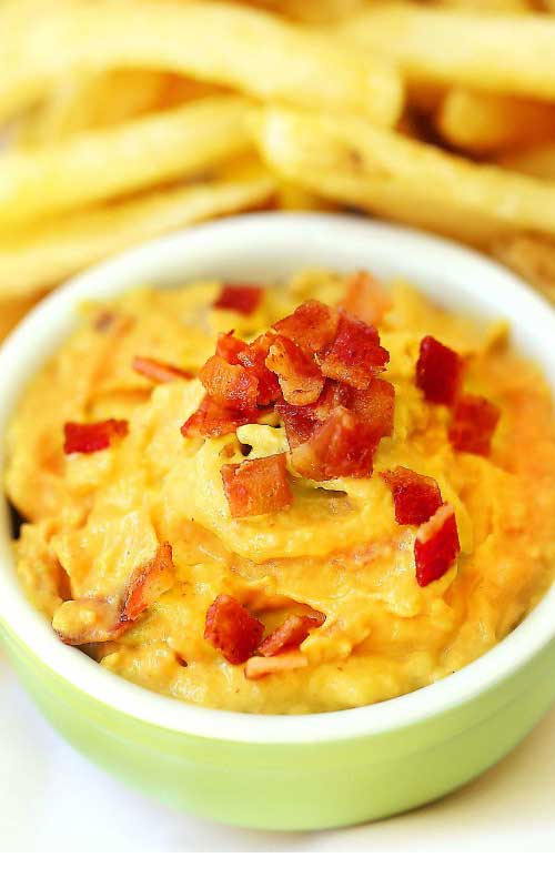 Recipe for Sriracha Bacon Avocado Dip - Your game-day guests will love dipping vegetables, chips, fries or wings in it or as a delicious spicy spread on sandwiches.