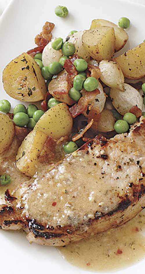 Recipe for White Balsamic Pork Chops with Roasted Potatoes - The key to timing this all-in-one dinner right is to marinate the pork first and then prep and cook the potatoes.