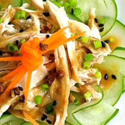 Recipe for Bang Bang Chicken - This is a refreshing dish of cucumbers and chicken topped with a nutty sauce spiked with Sichuan pepper.