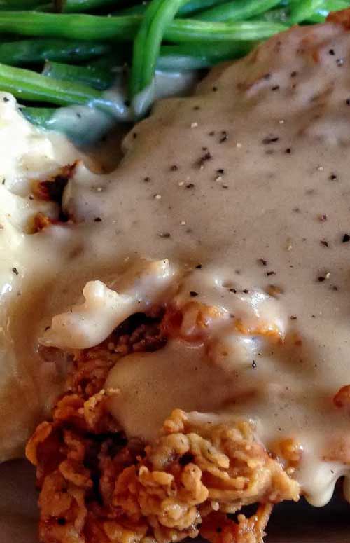 Recipe for Chicken Fried Steak - These crispy steaks smothered in gravy will earn raves when you serve them for dinner. You may almost feel guilty when you see how easy it is to make.