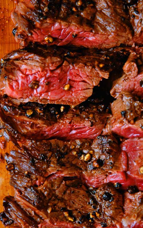 This Hanger Steak with Red Wine Sauce recipe gives you a melt in your mouth, delicious hanger steak. Without the fancy steakhouse prices taking a bite out of your wallet.