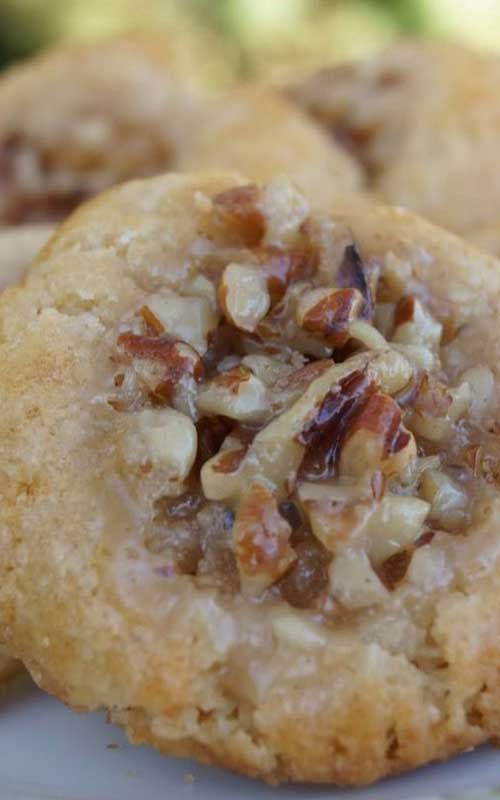 Recipe for Pecan Pie Thumbprint Cookies - One of my favorite pies in changed up to be in cookie form. YUM!