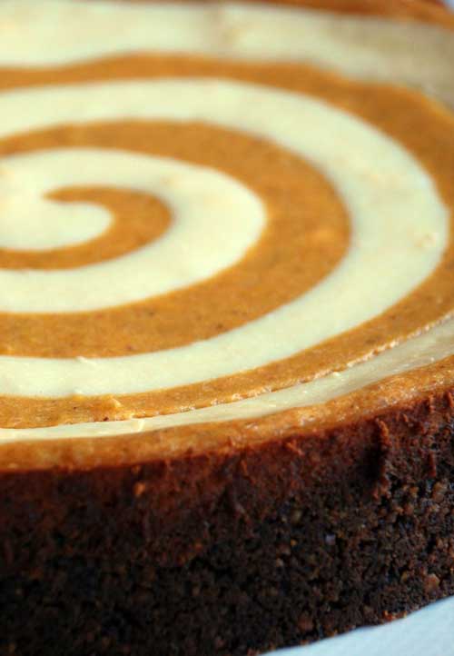 Recipe for Pumpkin Cheesecake - This is the ultimate pumpkin cheesecake. It has a unique gingersnap crust and rich, luscious swirls of cheesecake and pumpkin. If you want something extra special you have to try this recipe.