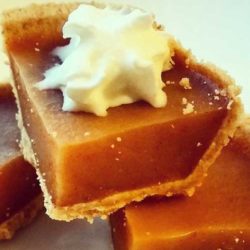 Recipe for Pumpkin Pie Jello Shots - These are the absolute best thing EVER! Perfect for any fall party. Have fun with these cute little pie shots!