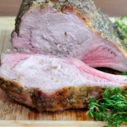 Recipe for Slow-Roasted Pork Rib Roast - A pork rib roast is the pork version of a beef rib roast: juicy, delicious, and impressive, but without the impressive price.