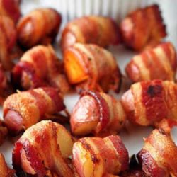 Recipe for Bacon Wrapped Rosemary Potatoes - The perfect party food...potatoes and bacon! This is my goto recipe for any party, and they ALWAYS disappear!