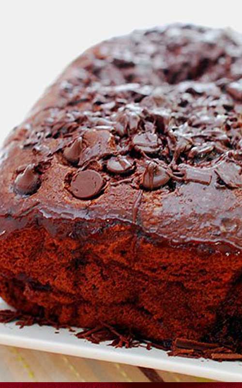 Recipe for Quadruple Chocolate Loaf Cake - Moist, chocolaty, dense, rich - and I think it goes without saying, decadent. I think the most charming thing about this cake is it was probably the easiest dang thing I ever made in my life!