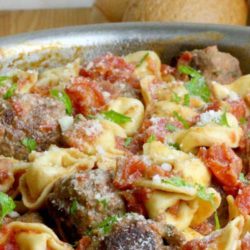 Recipe for Skillet Tortellini & Meatballs - This comes together all in one skillet, has great fresh flavor thanks to a quick and easy sauce. Its hearty, delicious and a real family pleaser!