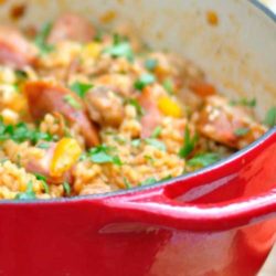 Recipe for Jambalaya with Chicken, Sausage, and Ham - This spicy dish will probably go over like gangbusters, but without leaving you with too many dishes to wash.