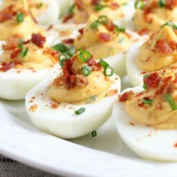 Recipe for Smoky Deviled Bacon And Eggs - These yummy deviled eggs went over so well at our summer cookouts, I started making them for holiday dinners as well. Everyone likes the addition of crumbled bacon.