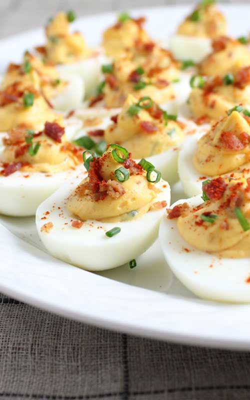 Recipe for Smoky Deviled Bacon And Eggs - These yummy deviled eggs went over so well at our summer cookouts, I started making them for holiday dinners as well. Everyone likes the addition of crumbled bacon.