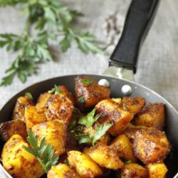 This is a healthy recipe for Bombay Potatoes, a typical Indian dish. Quick and simple, and oh sooo yummy!