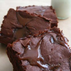 Recipe for Dulce de Leche Brownies - My favorite brownie recipe amped up with creamy caramel rivers of dulce de leche.