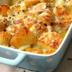 Recipe for Bacon-Studded Potato Gratin - Here's more evidence that you can never have too much cheese, bacon, or starch.