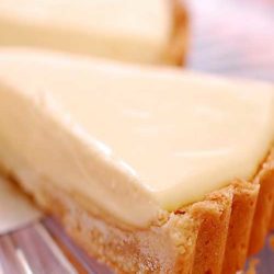 This French Lemon Cream Tart is creamy and light - yet rich and decadent too - and balances sweetness and tartness just right. Delicious!
