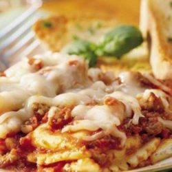 Recipe for Do-Ahead Ravioli Sausage Lasagna - Get a jump start on a delicious casual dinner. Make a pasta casserole the day before and tuck it in the fridge for next-day baking.
