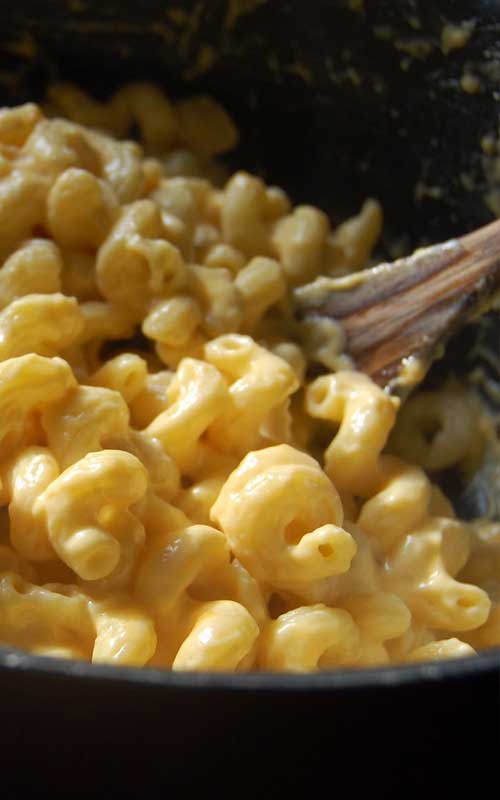 Recipe for Creamy Stovetop Macaroni and Cheese - This comes together very quickly, and you won’t believe how delicious it is. This recipe for macaroni and cheese tastes even better than a version made with Velveeta, and it’s every bit as creamy.