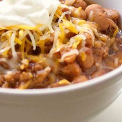 Recipe for Crock Pot Chili with Beans - This hearty chili has a mild flavor, perfect for families with kids. It's easy to customize and add your favorite toppings.