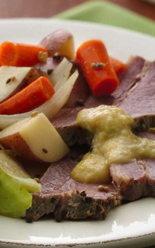 Recipe for Slow-Cooker Corned Beef and Cabbage - You have the luck of the Irish on your side when you rely on your slow cooker! The perfectly seasoned corned beef turns out tender every time.