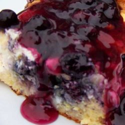 Recipe for Blueberry French Toast - The french toast casserole is loaded with bread, cream cheese, and blueberries. My favorite part is the sauce - I have no doubt that we'll be making this sauce over and over again to pour on our pancakes or ice cream. It's absolutely delicious.