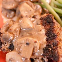 Recipe for Country Fried Steak with Mushroom Gravy - London Broil, pounded and breaded in a flavorful whole grain breading and cooked to a medium-rare. It was delicious, but the mushroom gravy was the best part!