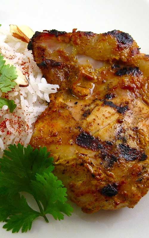 Recipe for Chicken Tikka on the Grill - Cooked either on a stovetop grill pan or over a flame, this chicken is incredibly succulent and flavorful - a fantastic alternative to your run-of-the-mill barbecue sauce.