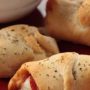 Recipe for Pepperoni Pizza Crescent Roll-Ups - Five-ingredient pizza roll-ups are ready for snacking or lunchtime in half an hour. It would even be a great recipe to let your kids make...and what kid doesn't like pizza?