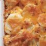 Recipe for Potato, Cauliflower, and Cheddar Bake - Adding cauliflower to a potato bake may seem crazy, but it adds great texture. A cheesy topping is a nice change of pace from the usual creamy casserole too.
