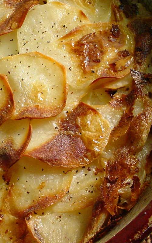 Recipe for Light Scalloped Potatoes - The problem with most scalloped potato recipes is the calories. This recipe is creamy, soft, thin, and light without all the fat and calories!