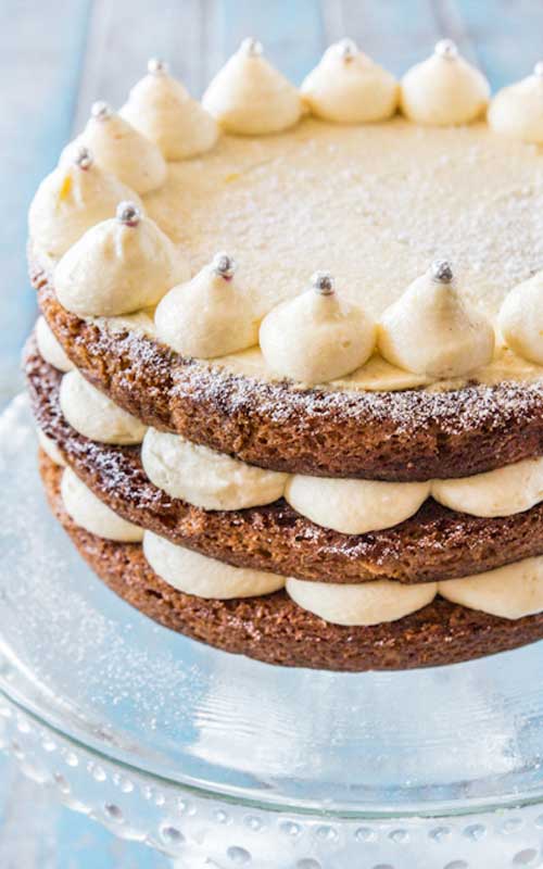 Recipe for Carrot Cake with Lemon Ginger Mascarpone Icing - Take an extra delicious carrot cake and top with an icing that is zesty and light and definitely not too sweet, and you get this not to be missed treat!