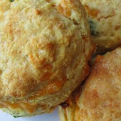 Recipe for Flaky Cheddar-Chive Biscuits - So easy, so delicious. Especially when eaten fresh out of the oven. Make sure you have plenty of butter!
