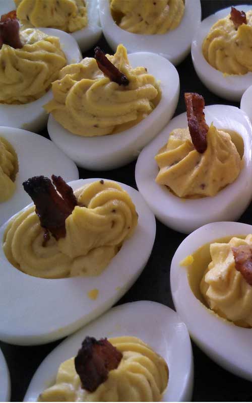 Recipe for Jalapeno Bacon Deviled Eggs - Deviled eggs are a must-have on Easter Sunday. Jalapeno bacon deviled eggs add zest to the classic recipe.
