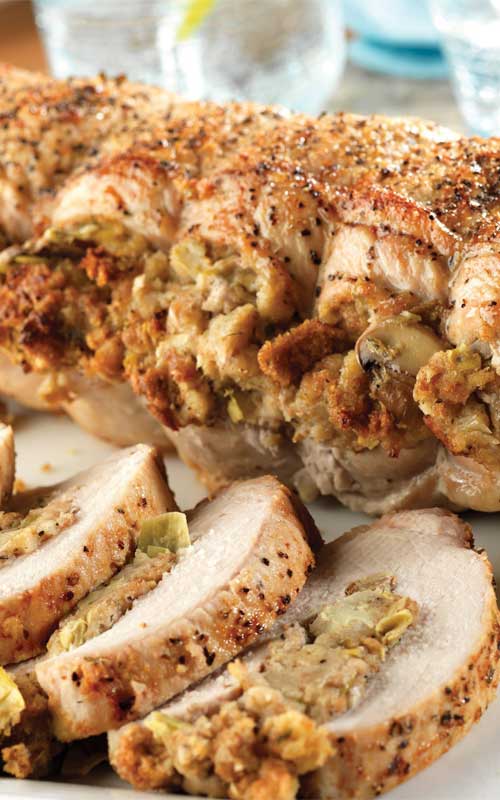 Recipe for Pork Roast with Herbed Artichoke and Mushroom Stuffing - We love this springtime artichoke and mushroom-stuffed pork roast that’s not only elegant but juicy and delicious!